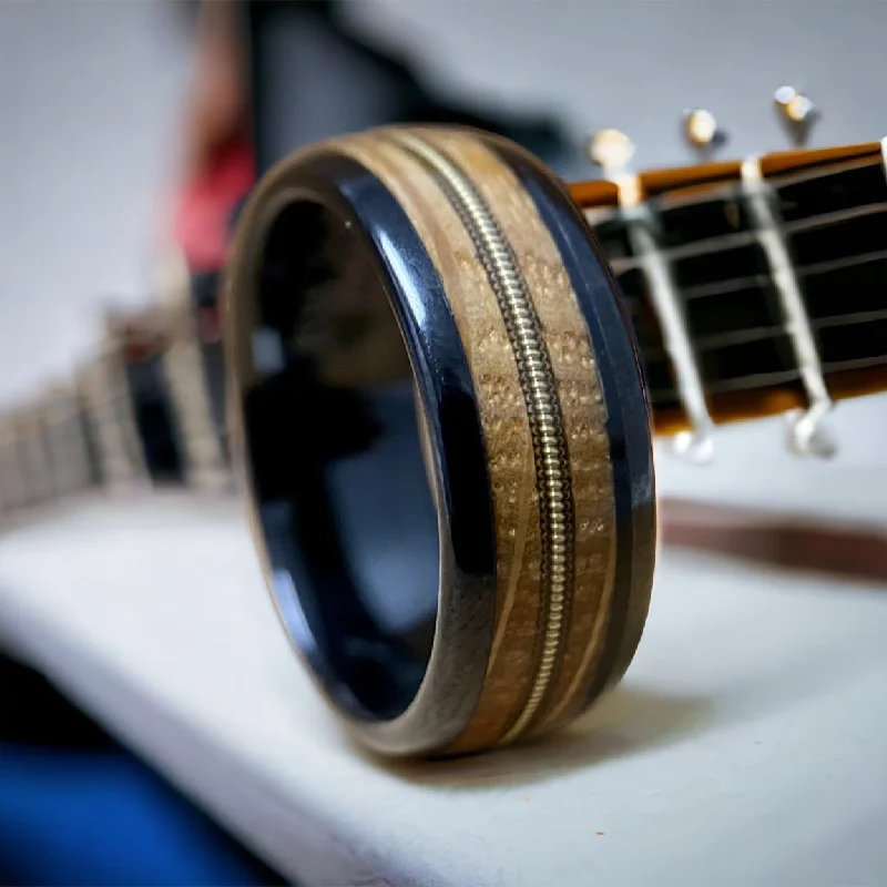 Artisan-made rings-“The Bluegrass Guitar Player”  Kentucky Bourbon Whiskey Barrel Black Ceramic Ring With Guitar String