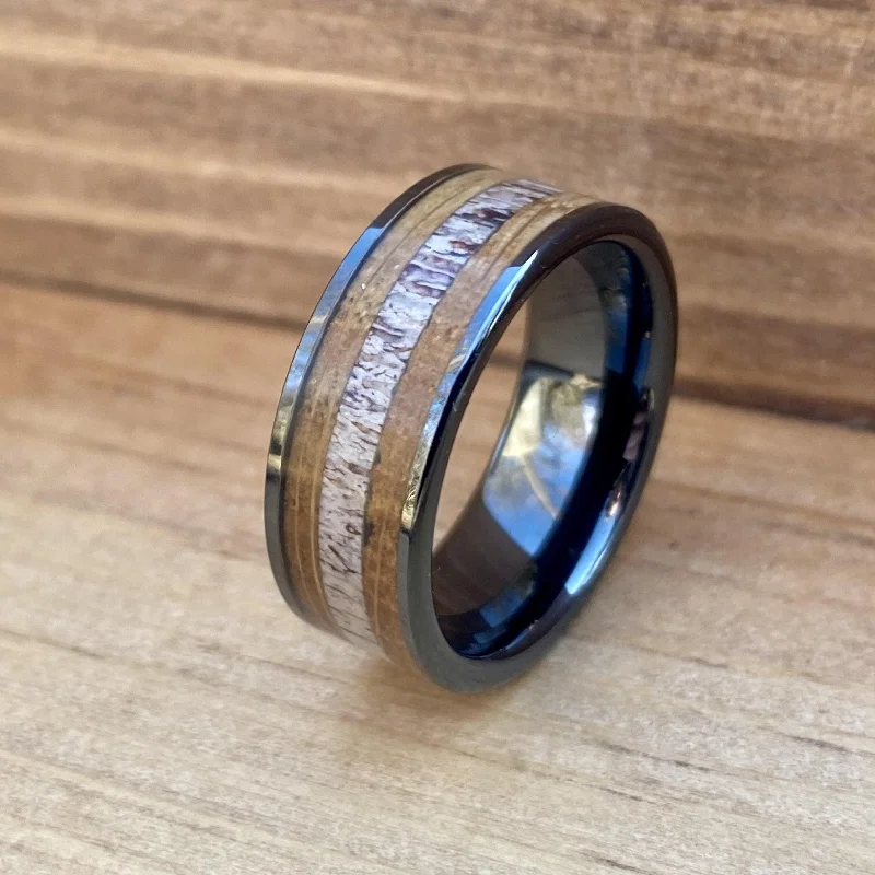 Intricate accent rings-"The Outdoorsman" Black Ceramic Ring With Deer Antler and Bourbon Whiskey Barrel Wood