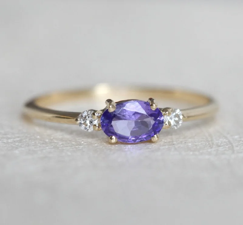 Carved band rings-Brittany Oval Tanzanite Ring With Accent Diamonds