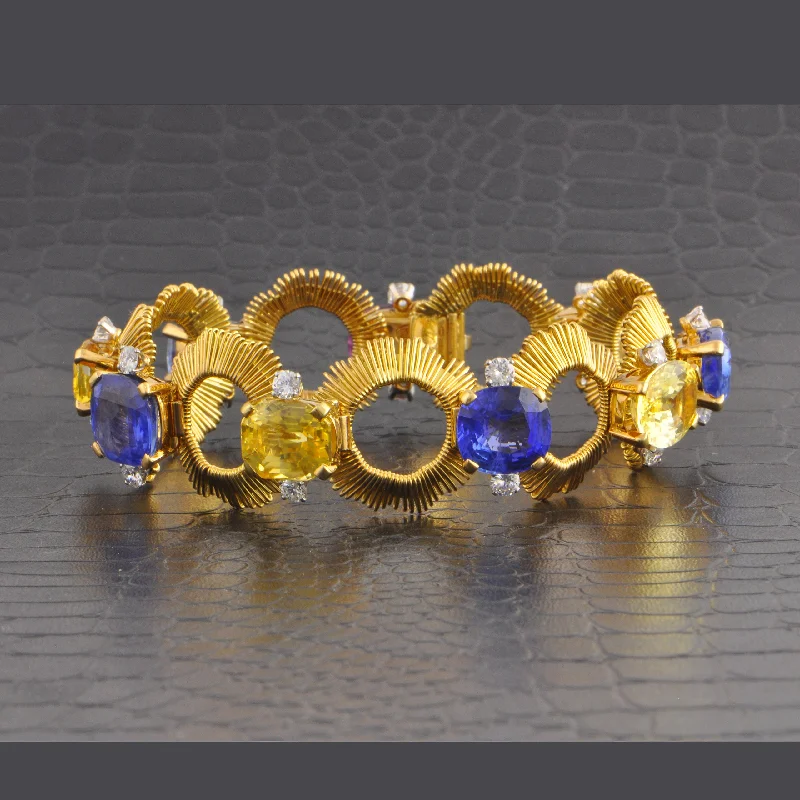 Trapezoid shape bracelets-Vintage Gubelin 1960s Multicolored Sapphire and Diamond Bracelet in 18k Yellow Gold and Palladium