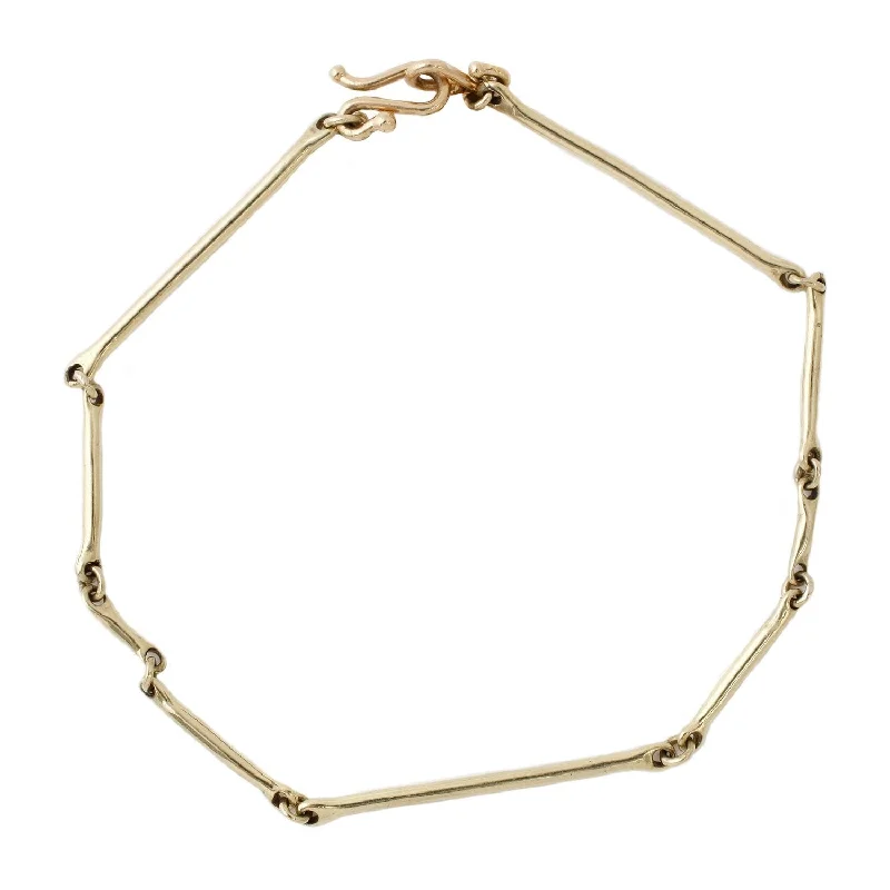 Bowed charm bangles-Cast Line Gold Bracelet