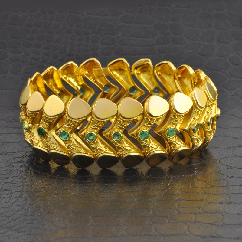 Gleaming diamond bangles-Magnificent Vintage Chevron Style Emerald Bracelet in 18k Yellow Gold